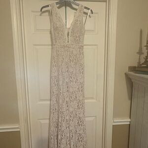 David's Bridal Lace Wedding Dress in White Lace with Nude lining.